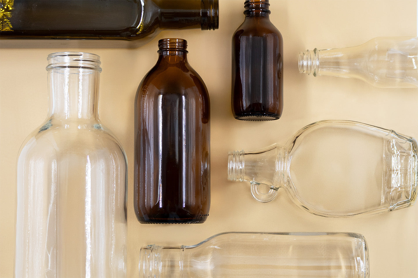 An assortment of bottles and jars made from glass, an established and trusted packaging material