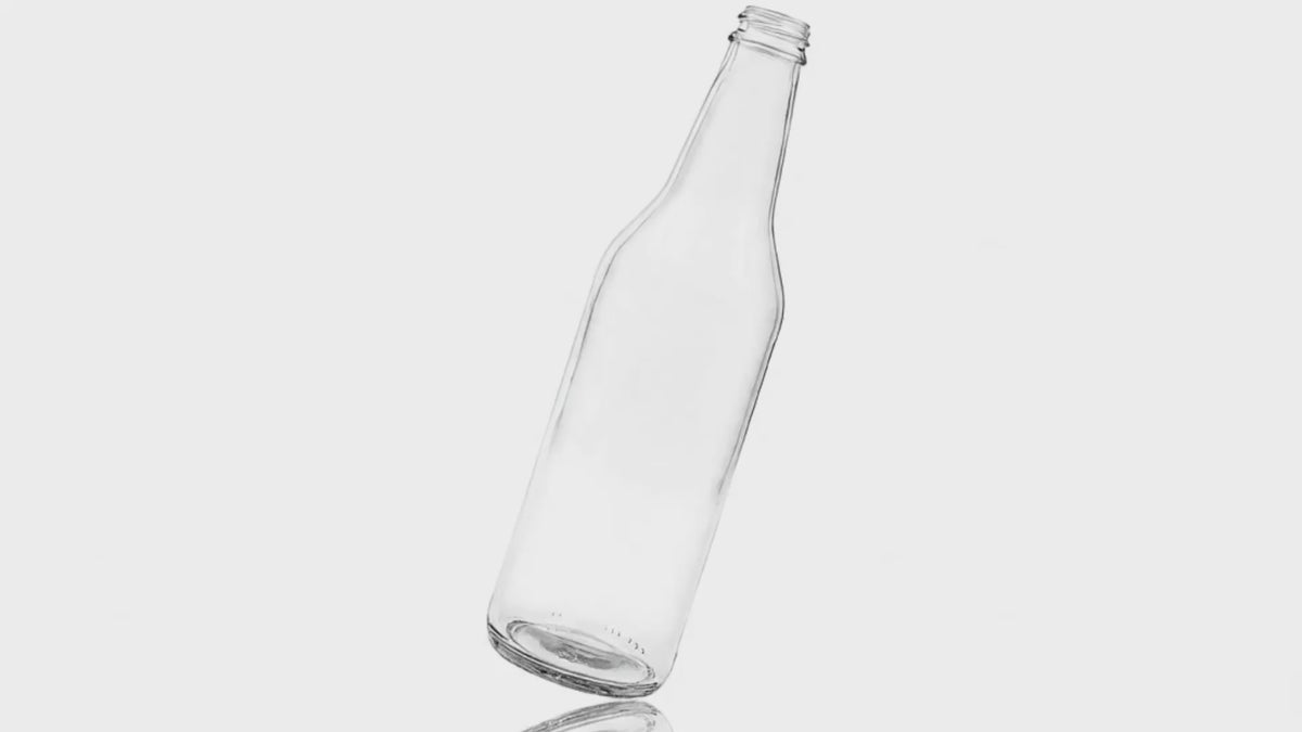 Load video: 16.9 oz Clear Glass Composite Round Bottle 28mm Fitment Finish