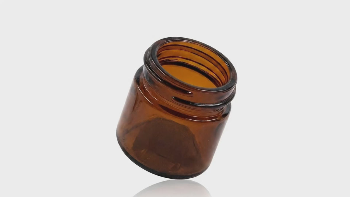 Load video: 4 oz Amber Glass Round Straight Sided Jar 58-400
