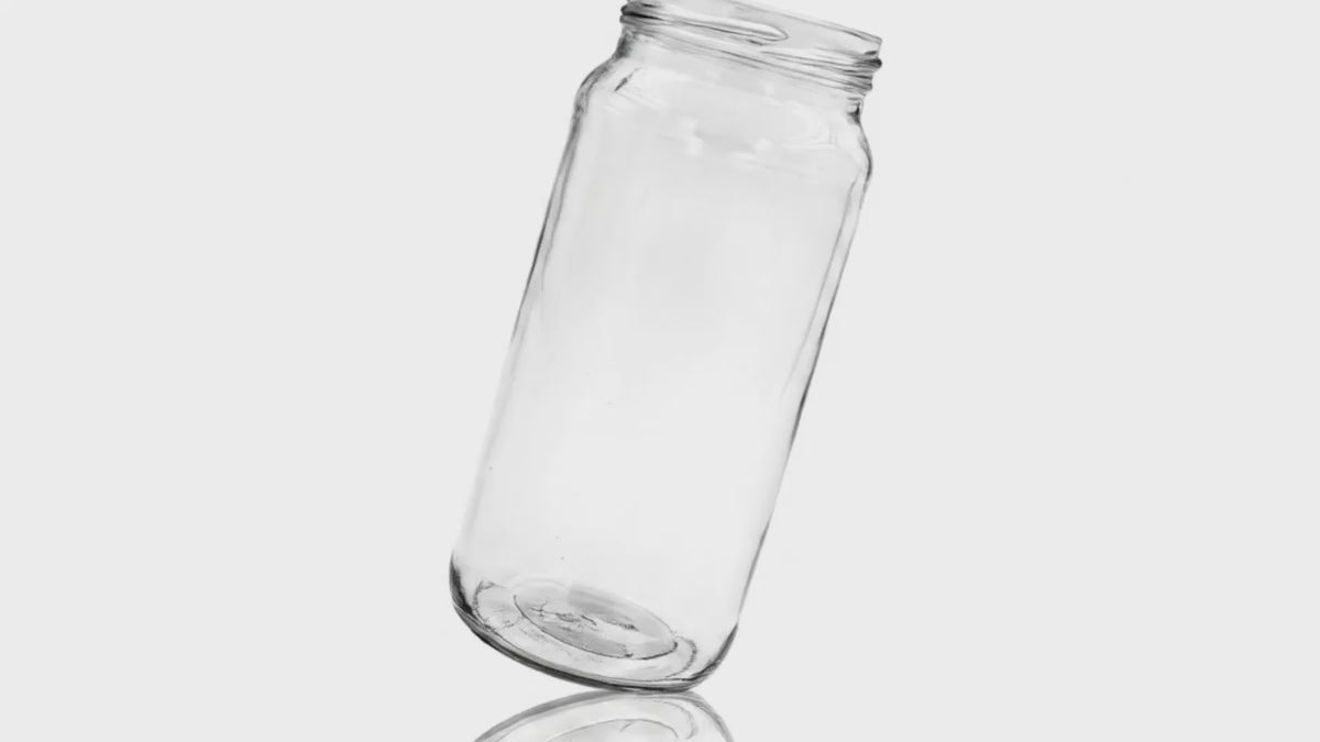 Load video: 16 oz Clear Glass Round Paragon Jar 63 mm Twist / Lug
