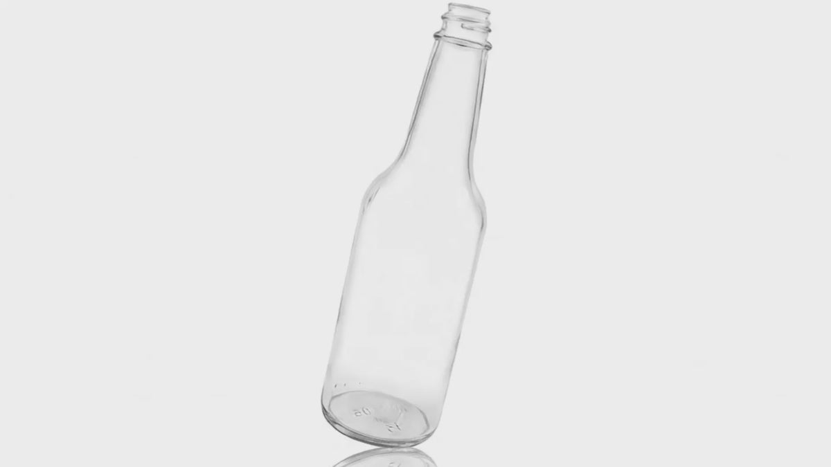 Load video: 10 oz Clear Glass Woozy Bottle 24-414