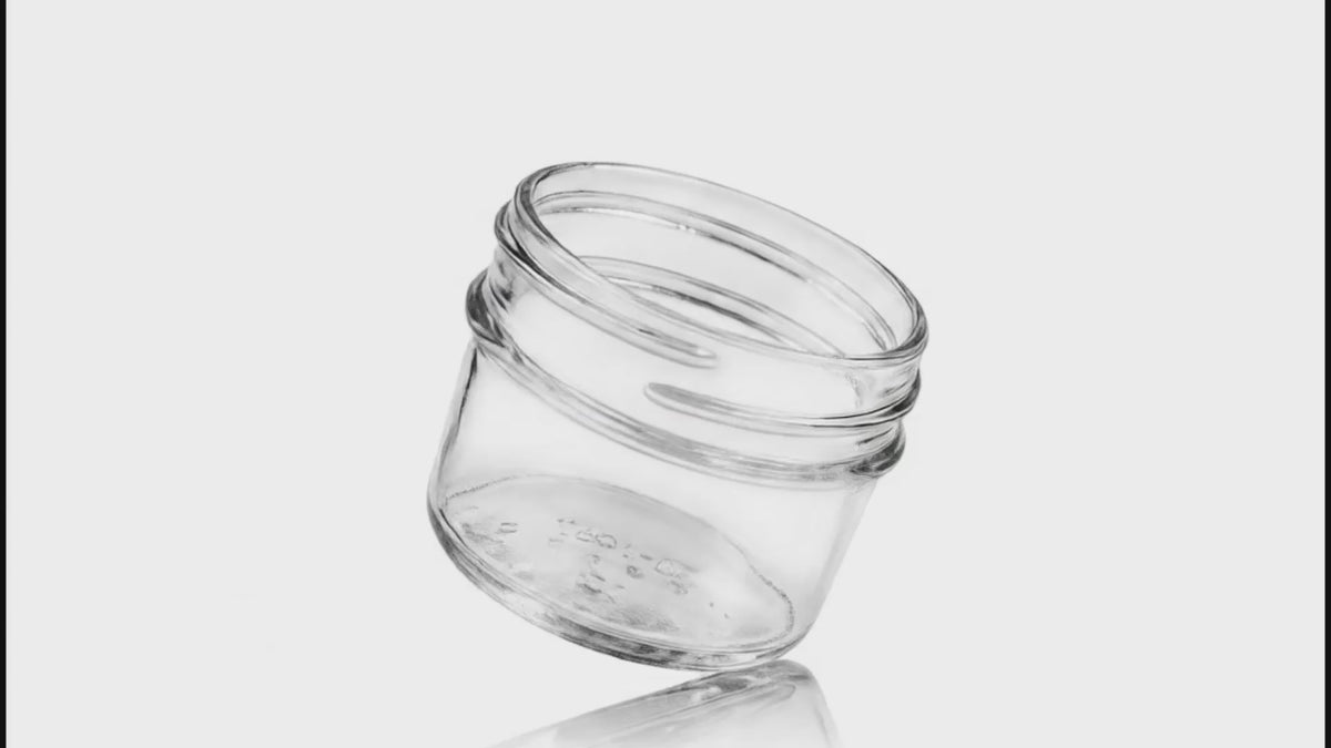 Load video: 4 oz Clear Glass Round Jelly Jar 70-450