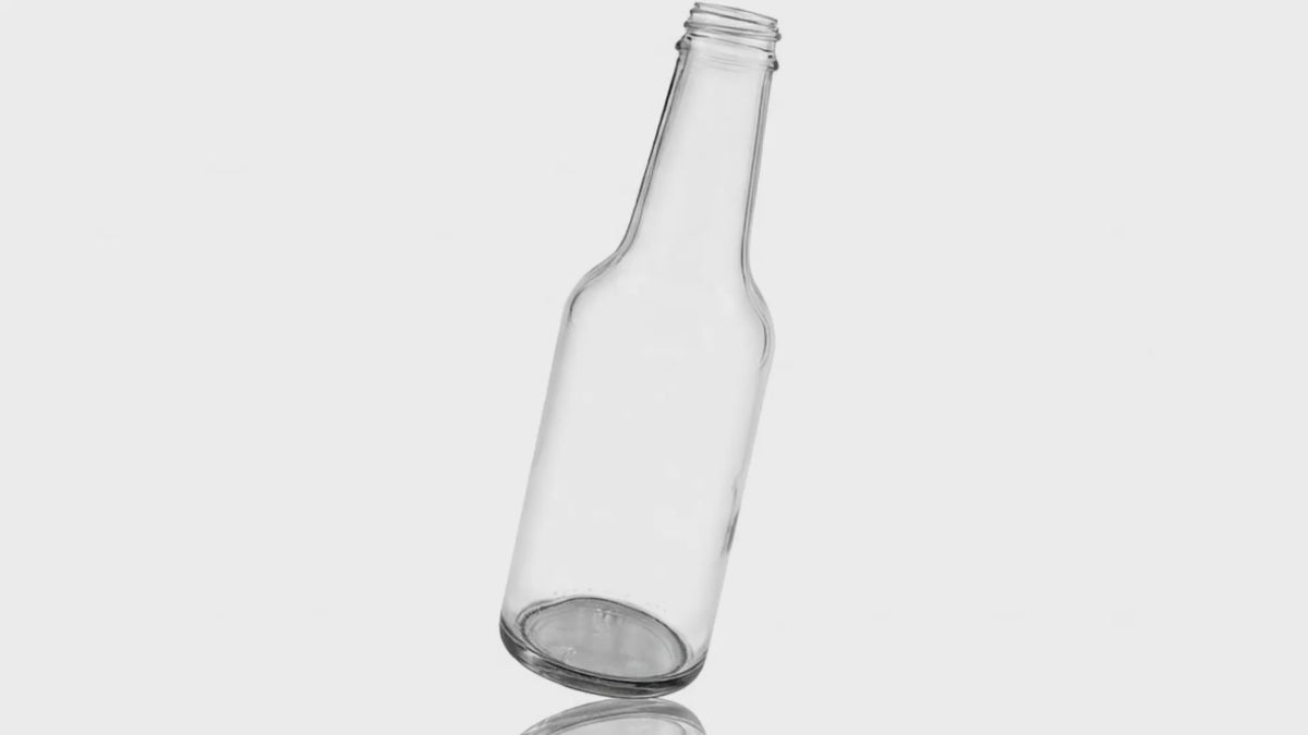 Load video: 10 oz Standard Flint Glass Round WOOZY (TALL CARTON) Bottle 28-490 (12)